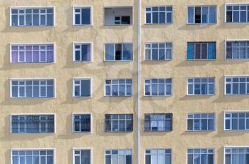 windows of a multistory building as background .