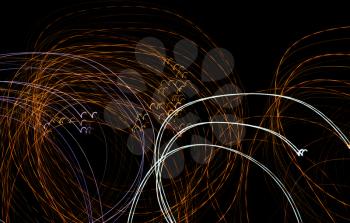 Abstract background of light bulbs at night in motion .