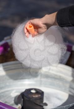 Cooking white sweet cotton wool from syrup