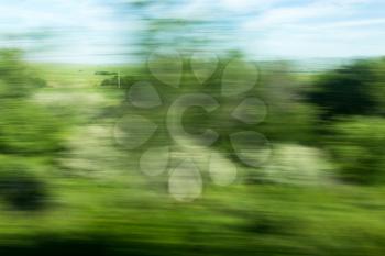Nature in motion from the train window .