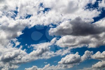 Beautiful clouds against blue sky as background .