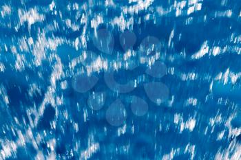 Abstract background of running blue water. texture