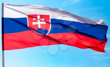 flag of Slovakia against the blue sky .