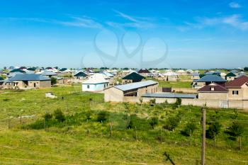 Houses in a settlement in Kazakhstan in the spring .