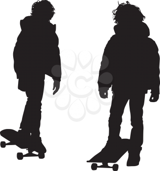 Royalty Free Clipart Image of Silhouetted Skateboarders