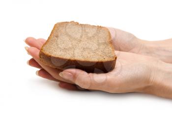 Royalty Free Photo of a Person Holding a Piece of Bread