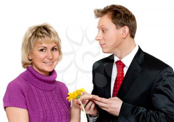 Royalty Free Photo of a Man Giving a Woman a Flower