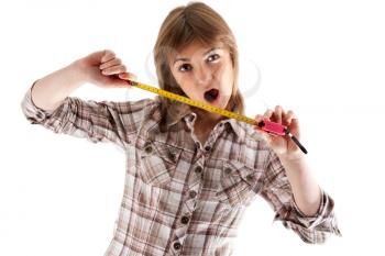 Royalty Free Photo of a Girl Holding a Tape Measure