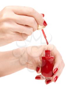 Royalty Free Photo of a Woman Painting Her Nails