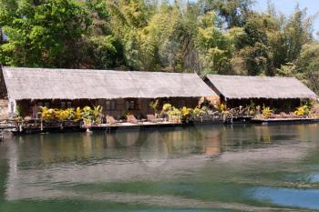 Royalty Free Photo of a Riverside Bungalow Kvay in Thailand