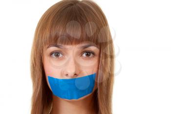Royalty Free Photo of a Girl With Her Mouth Taped