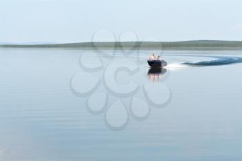 Royalty Free Photo of a Boat on the Lake