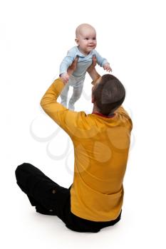 Royalty Free Photo of a Father Holding His Baby