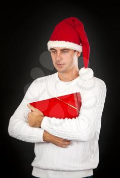 Royalty Free Photo of a Man Holding a Present