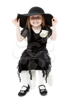 A little sweet girl felt hat is scary faces