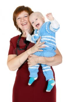 grandmother with her grandson in her arms in the studio on a white background