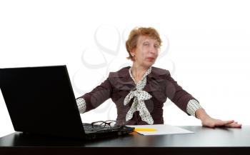 middle-aged woman at a computer on a white background