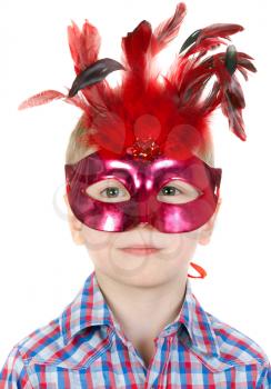 The Boy in the masquerade mask with feathers on a white background