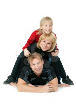 happy family lying on the floor, isolate on white