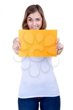 Beautiful girl with a yellow sheet of paper winks, isolate on white