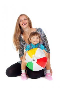 Mother and daughter playing in an inflatable ball in the studio on a white background