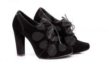 Black high heel women shoes on white background. Studio shot.