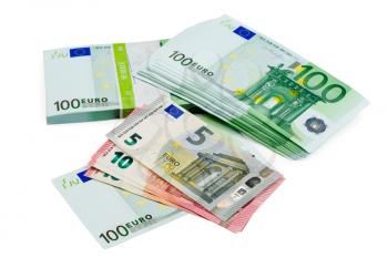 Euro banknotes of different denomination closeup isolate on white