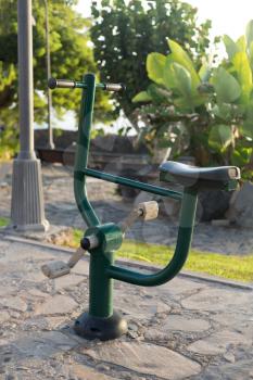 Bike training apparatus in the park on the beach, summer, sunny day.