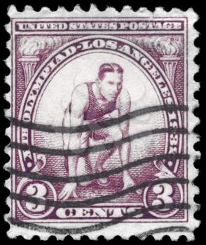 Royalty Free Photo of a 1932 US Stamp of a Runner at the Starting Mark, for the 10th Olympic Games
