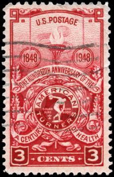 Royalty Free Photo of 1948 US Stamp Shows the Torch and American Turner's Emblem, Centenary of the Formation of the American Turners Society