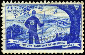 Royalty Free Photo of 1953 US Stamp Shows Agricultural Scene and Future Farmer, 25th Anniversary of Future Farmers of America