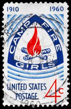 Royalty Free Photo of 1960 US Stamp Shows the Camp Fire Girls Emblem, 50th Anniversary