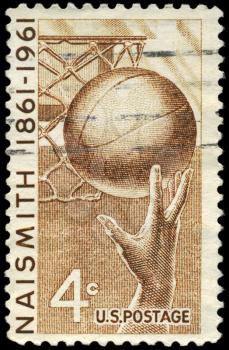 Royalty Free Photo of 1961 US Stamp Shows a Hand and Basketball Honouring James Naismith (1861-1939)