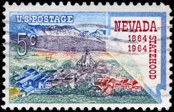 Royalty Free Photo of 1964 US Stamp Shows Virginia City and Map of Nevada, Statehood Centenary