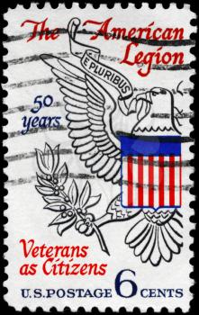 Royalty Free Photo of 1969 US Stamp Shows the Eagle from Great Seal of U.S., Devoted to American Legion, 50th Anniversary