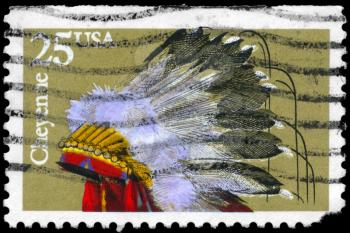 Royalty Free Photo of 1990 US Stamp Shows the Indian Headdresses of the Tribe Cheyenne