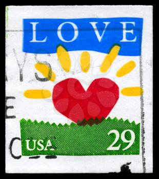 Royalty Free Photo of 1994 US Stamp With a Heart and the Word Love on It