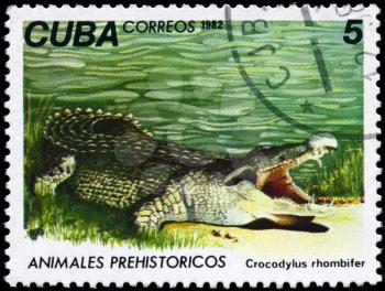 CUBA - CIRCA 1982: A Stamp printed in CUBA shows image of a Crocodile with the designation Crocodylus rhombifer from the series Prehistoric Fauna, circa 1982