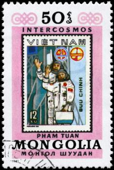 MONGOLIA - CIRCA 1981: A Stamp printed in MONGOLIA devoted to the first Vietnamese cosmonaut Pham Tuan, from the series Intercosmos, circa 1981