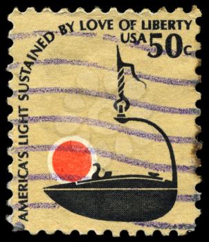 USA - CIRCA 1979: A Stamp printed in USA shows the Iron Betty Lamp, 17th-18th Cent., series, circa 1979