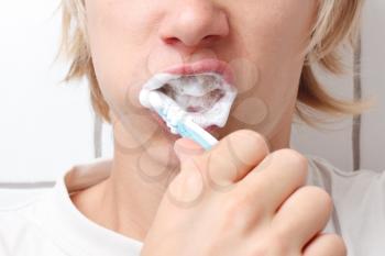 Royalty Free Photo of a Person Brushing Their Teeth