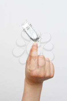 Royalty Free Photo of a Woman Holding a Condom