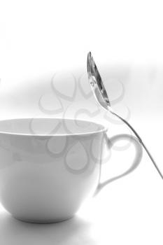 Royalty Free Photo of a Teacup and Spoon