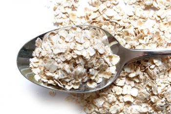 Royalty Free Photo of a Spoonful of Oats