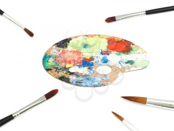 Royalty Free Photo of a Paint Palette and Paintbrushes