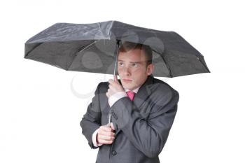 Royalty Free Photo of a Businessman Holding an Umbrella