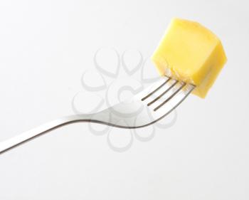 Royalty Free Photo of a Piece of Mango on a Fork