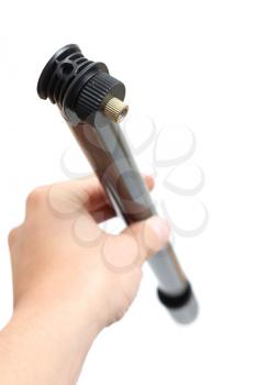 Royalty Free Photo of a Person Holding a Pump