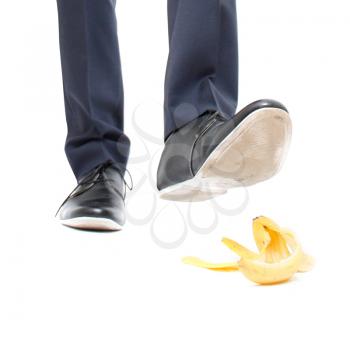 Royalty Free Photo of a Person Stepping on a Banana Peel