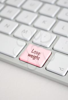 Royalty Free Photo of a Lose Weight Button on a Keyboard
